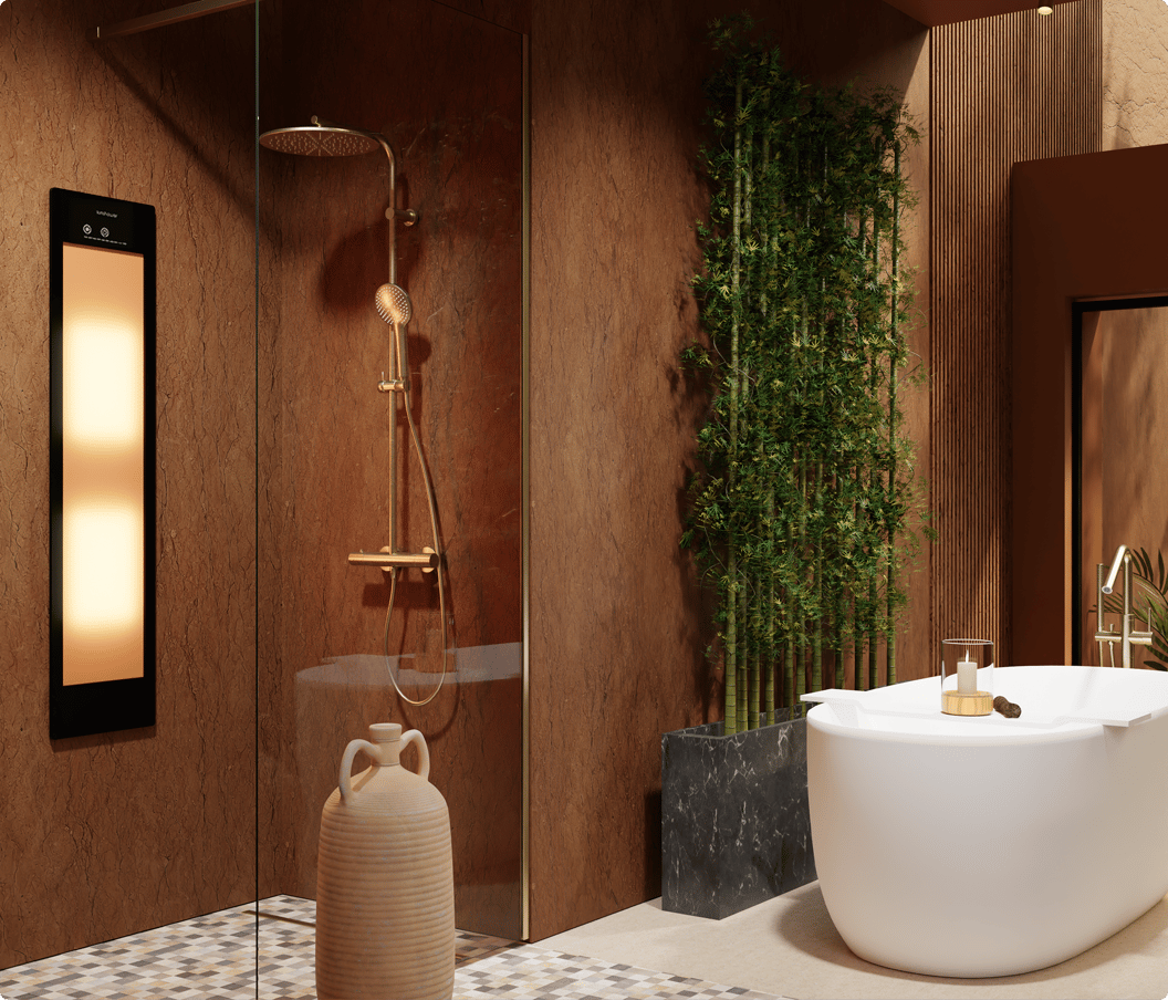 Baignoire autoportante blanche dans une salle de bains Japandi chaleureuse avec accents boisés, mur végétal et robinet doré. Tendances salle de bains 2026.