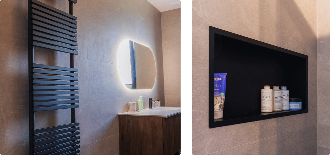 Gauche : Radiateur design noir à côté d’un meuble vasque en bois et miroir ovale éclairé. Droite : Niche intégrée avec produits de soins encadrée en noir.