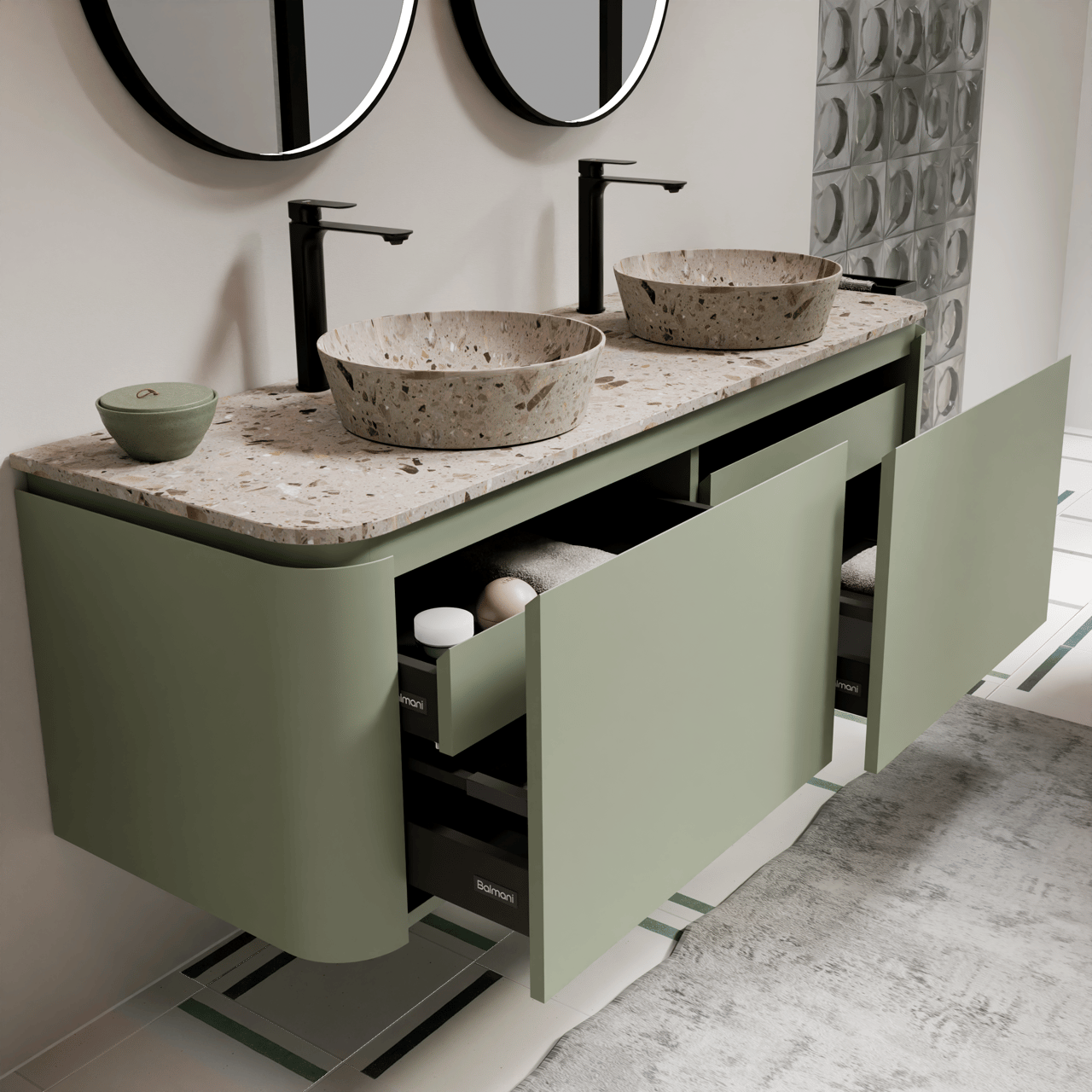 Moderner grüner Doppelwaschtisch mit Terrazzo-Aufsatzwaschbecken, schwarzen Armaturen, runden Spiegeln und geöffneten Schubladen.