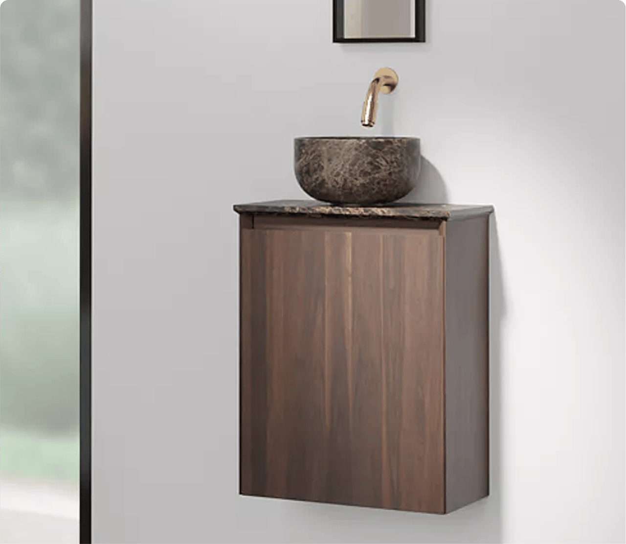 Een hangend badkamermeubel in donker hout met een ronde marmeren waskom en een gouden kraan. Pure luxe van x²o badkamers.