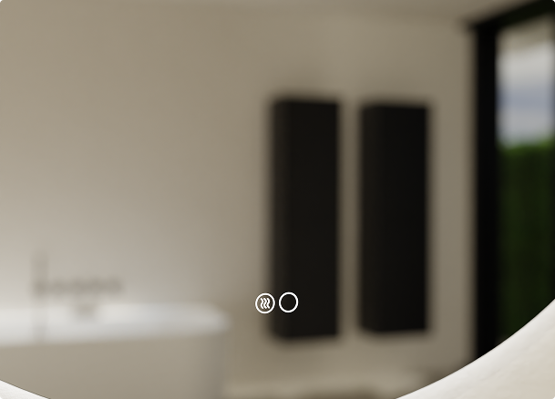 Reflet flou d'une salle de bains moderne vue à travers un miroir anti-buée X²O avec une icône tactile rétroéclairée activant la fonction de désembuage.