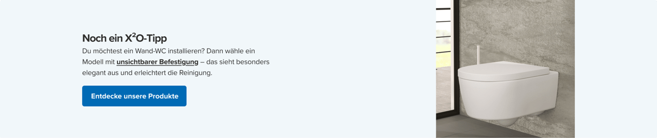 Ein weißes, rundes Wand-WC an einer rauen Betonwand mit passender Bürste – Industrial Style von x²o badkamers.