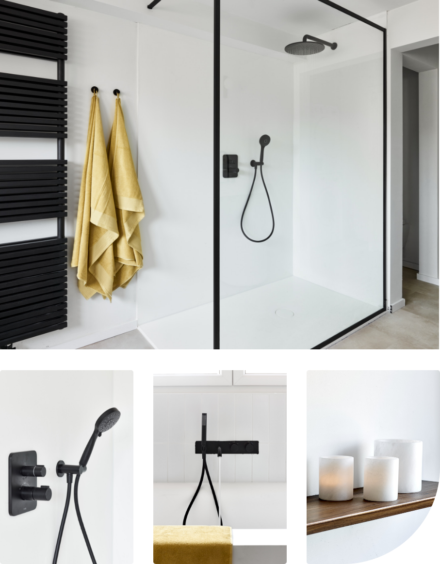 Reflectie van een vrouw in een badkamer met een zwarte kraan.