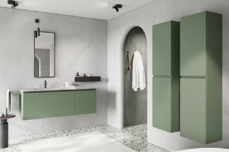 Moderne badkamer met groen zwevend wastafelmeubel, opbergkasten en terrazzo vloer voor een stijlvolle uitstraling.
