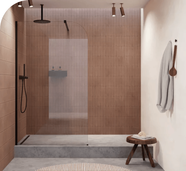 Douche à l'italienne avec carrelage terracotta, douche pluie noire et paroi vitrée sur une estrade.