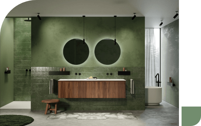 Salle de bain avec murs verts, meuble lavabo en bois, miroirs ronds et baignoire indépendante.