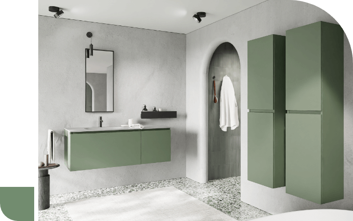 Salle de bain avec meubles verts, sols en terrazzo et lavabo moderne, design minimaliste et élégant.