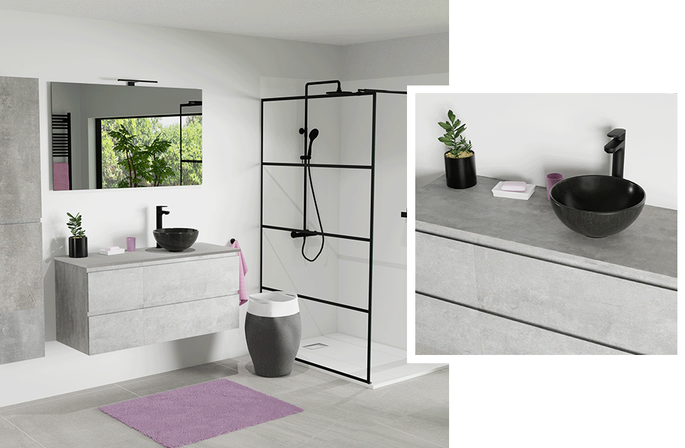 Badkamer met grijs wastafelmeubel, zwarte wastafel, inloopdouche en moderne accessoires.