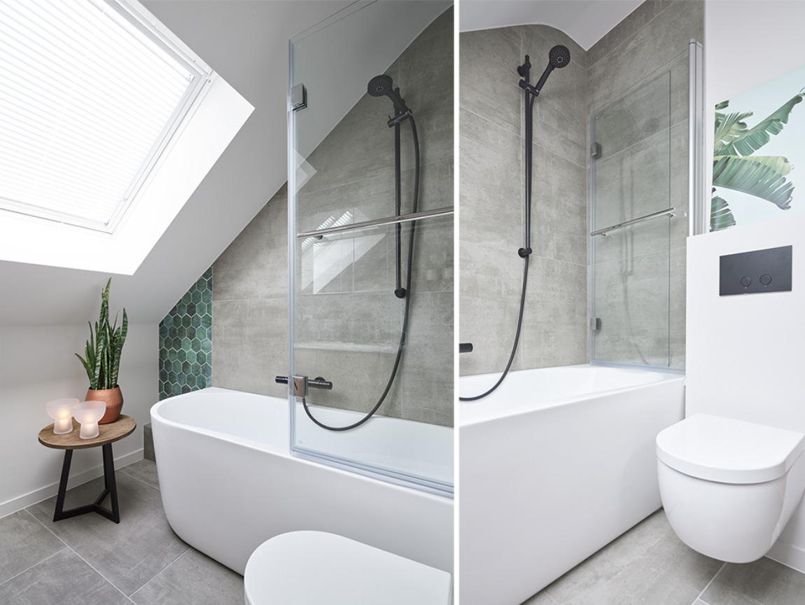 Een badkamer met een bad, een douchewand, een toilet en planten, omgeven door grijze tegels