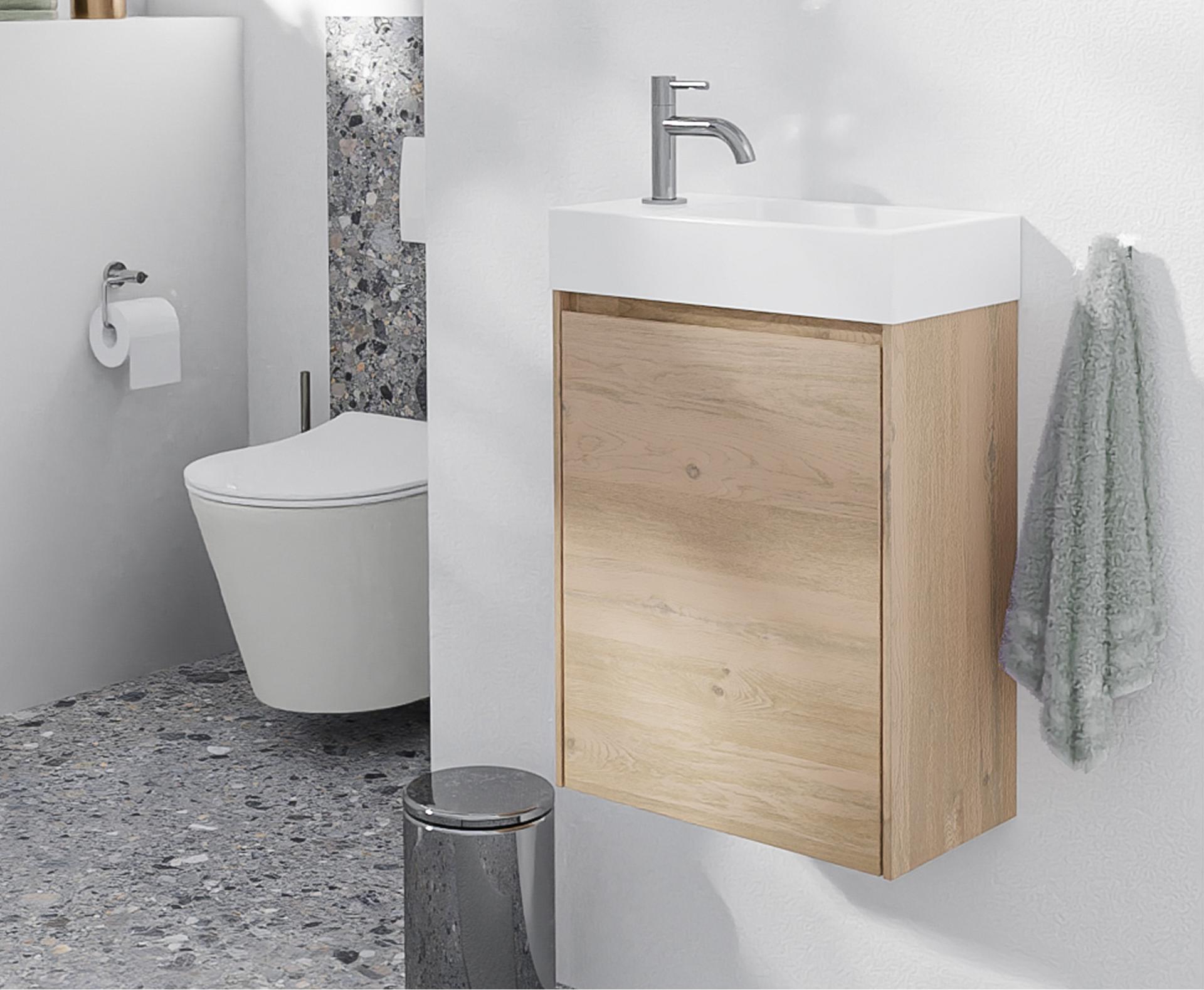 Petit meuble de salle de bains de x²o salles de bains avec meuble en bois, lavabo blanc et WC suspendu dans un espace compact.