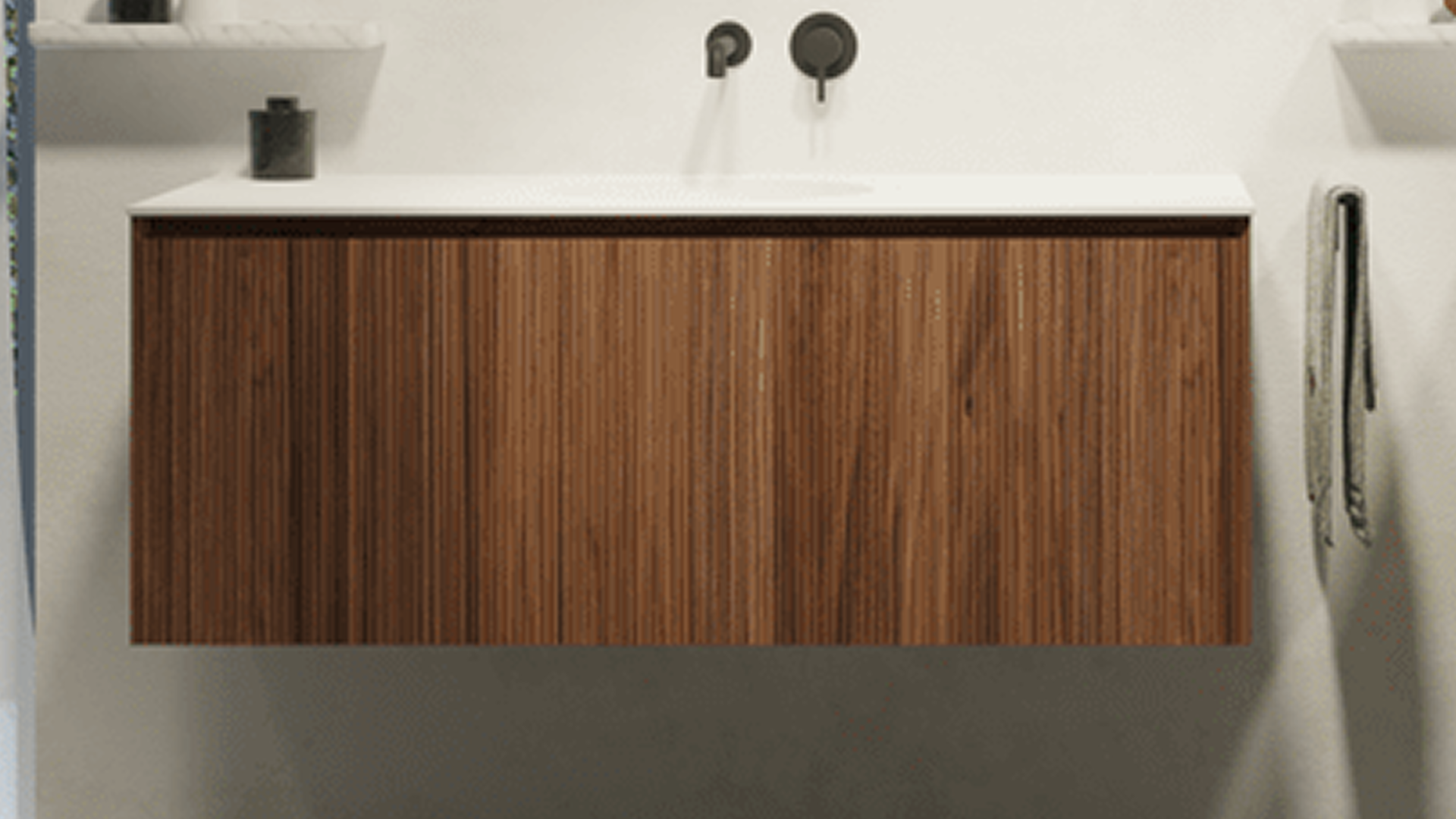 Meuble de salle de bains de x²o salles de bains avec finition placage bois foncé et design épuré sous lavabo blanc.