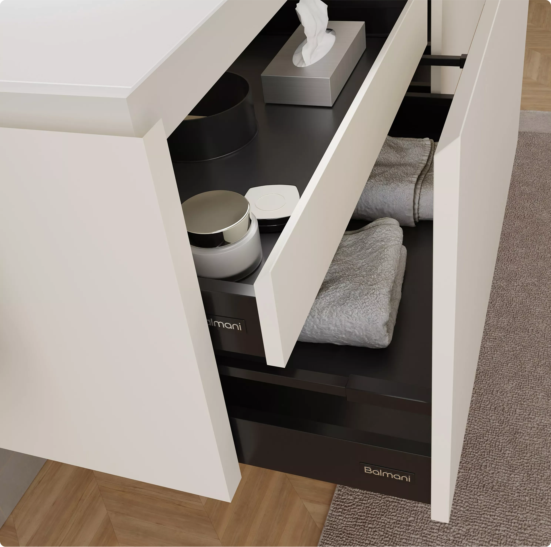 Offene Schublade eines Balmani-Badezimmermöbels mit Handtüchern, Taschentüchern und Pflegeprodukten