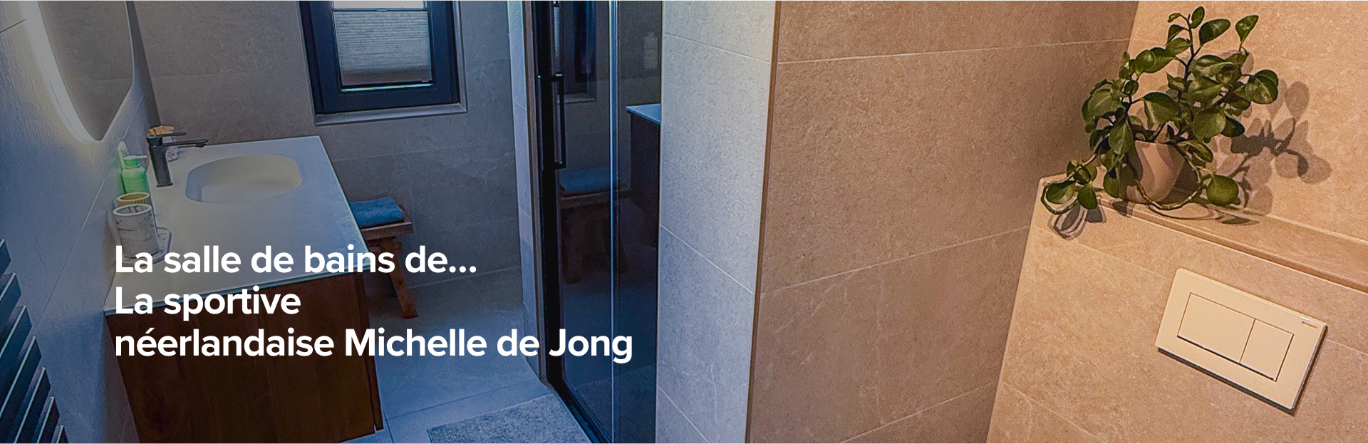 Vue d’ensemble de la salle de bain de Michelle de Jongg avec meuble moderne, miroir éclairé et paroi de douche en verre.