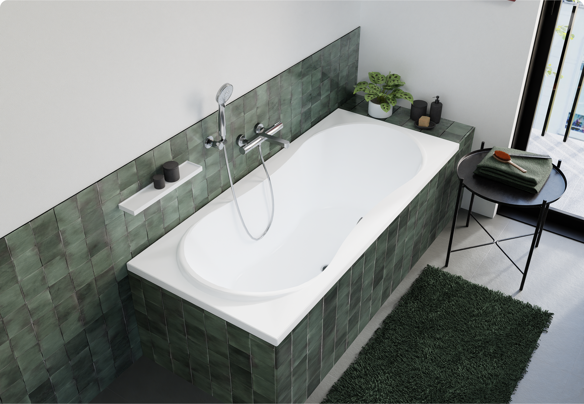 Deze foto van x²o badkamers toont een ingebouwde witte badkuip in een betegelde ombouw met groene tegels, een chromen douchekop en kraan, een plantje en zwarte accessoires op de rand en een ronde zwarte bijzettafel met handdoek en borstel.