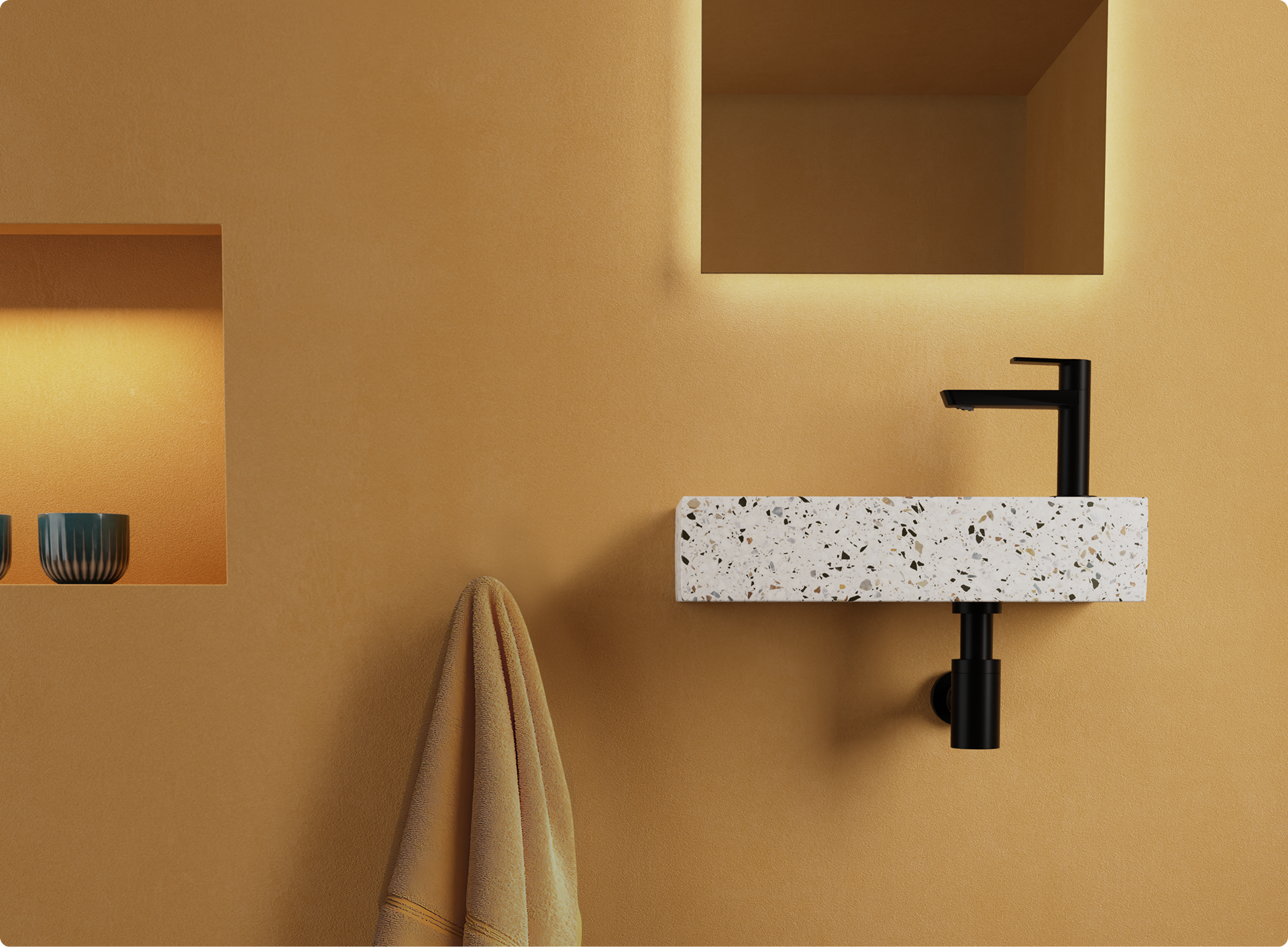 Trendy badkamer in okergeel, met terrazzo waskom en zwarte kraan. Een warme keuze binnen de badkamer trendkleuren 2026 bij X²O Badkamers.