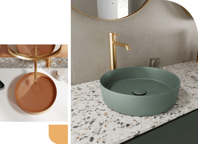 Design-Waschbecken mit runder grüner und terrakottafarbener Waschschüssel, goldener Armatur und Terrazzo-Platte.