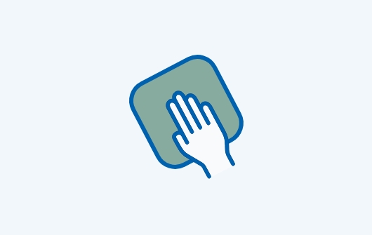 Icon mit einer Hand und einem Tuch, das die einfache Reinigung und Pflege von Melamin-Badmöbeln bei x²o Badezimmer zeigt.