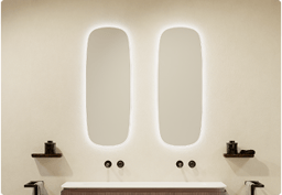 Deux miroirs ovales avec éclairage LED au-dessus du lavabo de X2O salles de bains