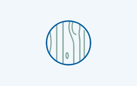 Rundes Icon mit stilisiertem Holzmotiv, das die verschiedenen Melaminarten und Oberflächen für Badmöbel bei x²o Badezimmer zeigt.