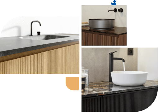 Waschbecken auf Holzschrank, schwarze Wasserhähne und Marmorarbeitsplatten.