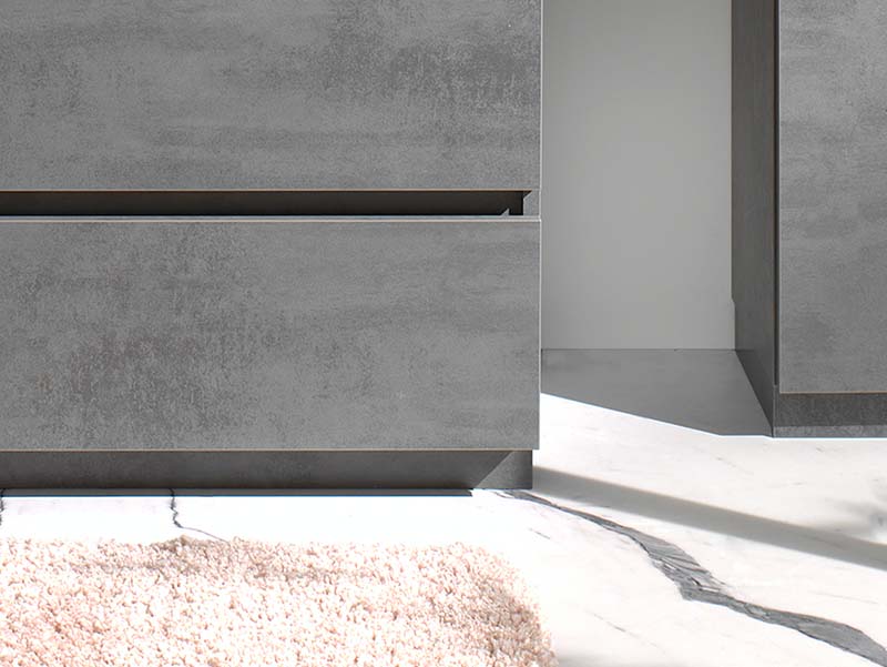 Meuble de salle de bain moderne avec tiroirs gris, design minimaliste et finition épurée sur sol en marbre.