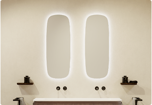 Twee ovale spiegels met ledverlichting boven wastafel van X2O badkamers, ideaal voor spiegel Black Friday deals.	