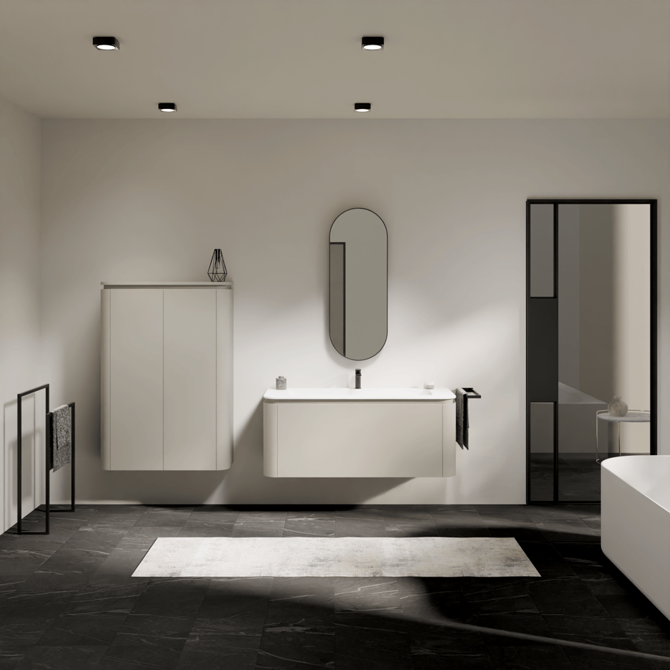 Minimalistisch wit badkamermeubel met afgeronde hoeken, ovale spiegel en modern zwevend design.